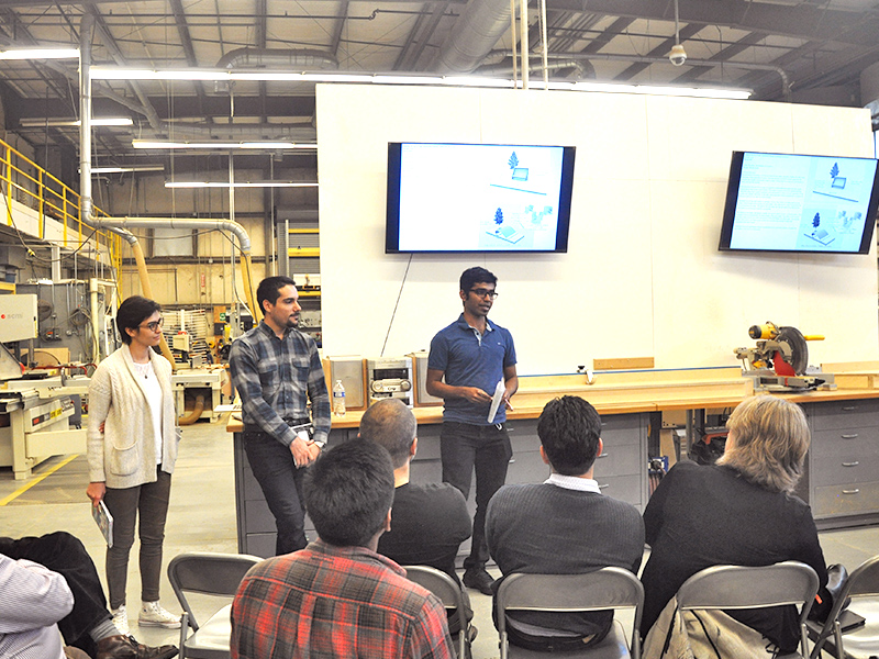 Students present research on the reuse of wind turbines for industry professionals in the Digital Fabrication Lab