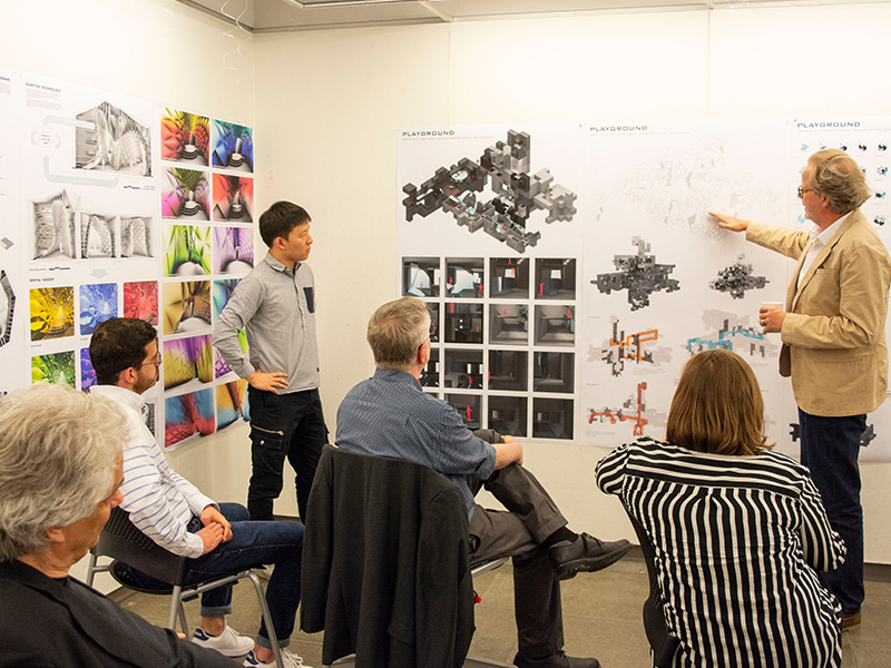 Master of Architecture students present their work in the Hinman Research Building's space referred to as The Cave.