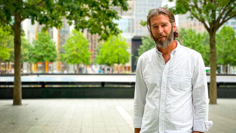 Photo of Michael Arad in front of National September 11 Memorial.
