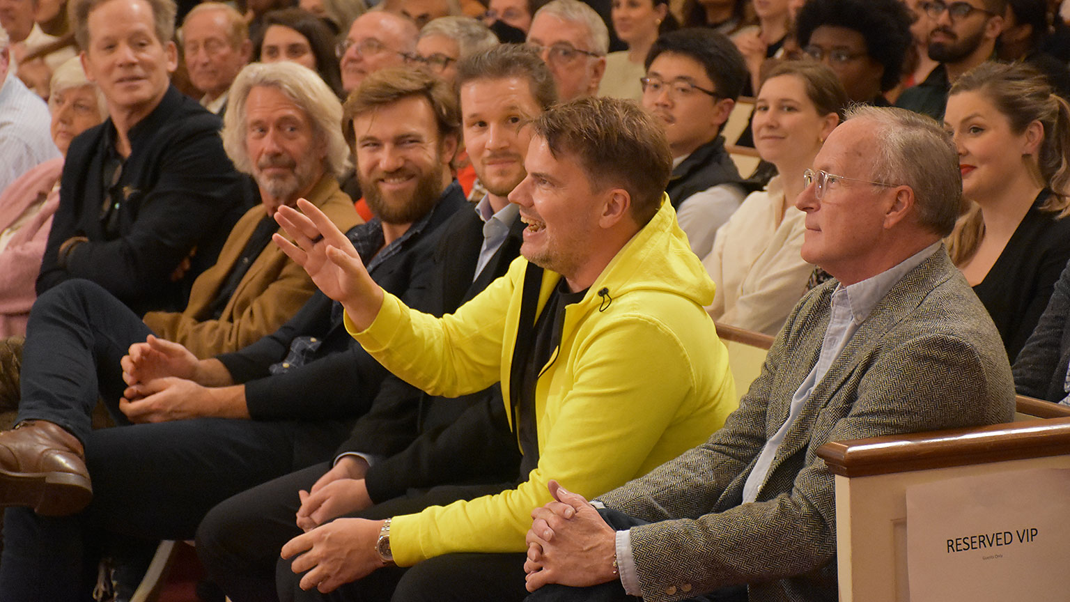 Bjarke Ingels sits in the lecture audience before his presentation.