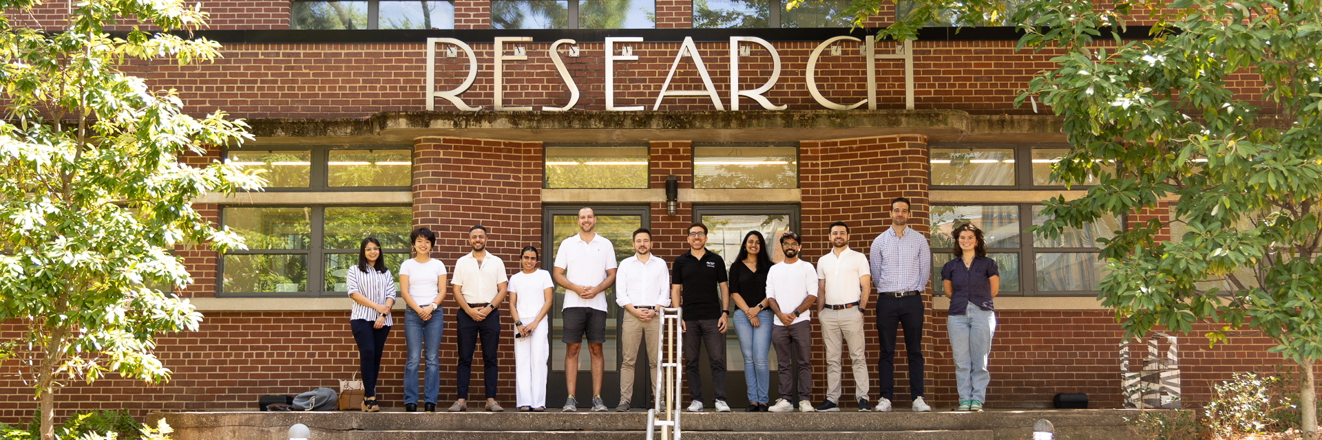 Members of the High Performance Building Lab pose outside the Hinman Research Building.