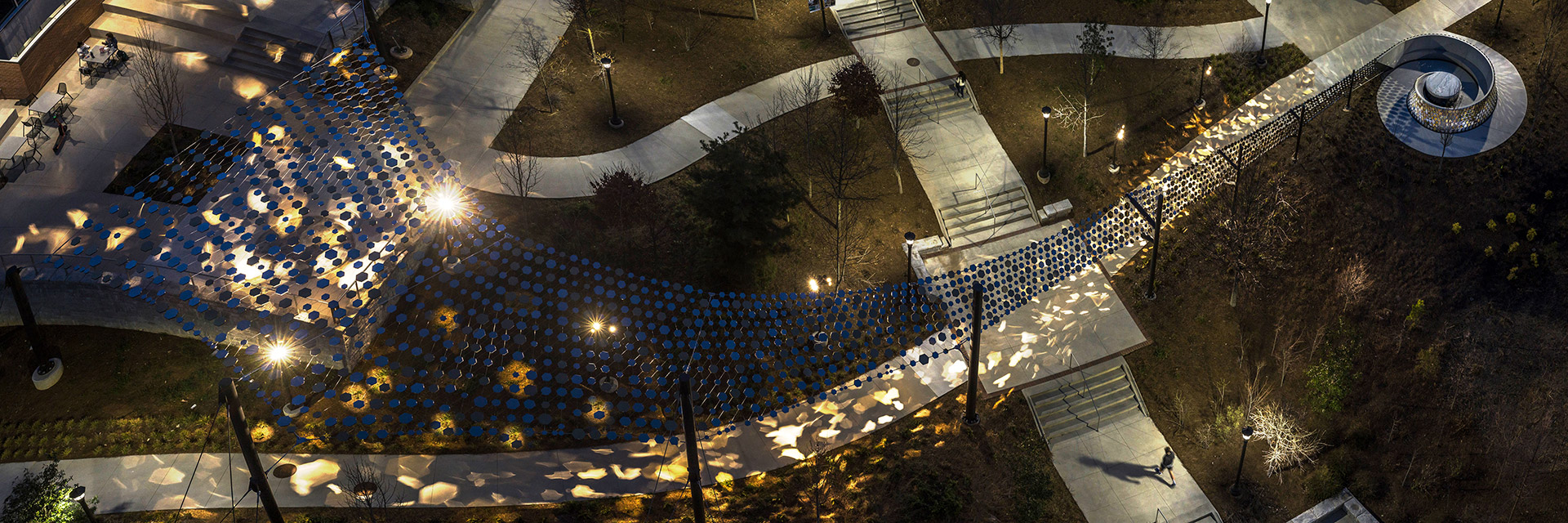 An aerial photo of the Path of Progress at night.