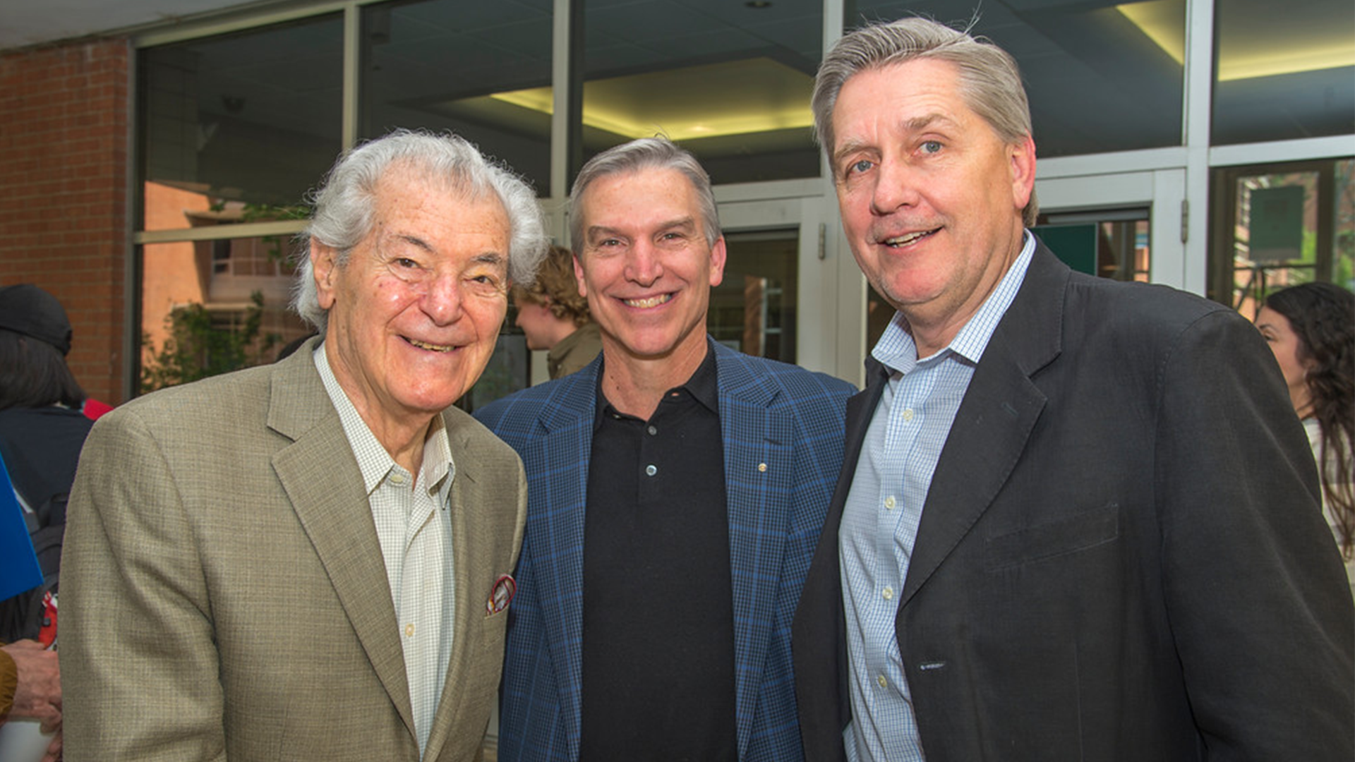 Bill Pulgram standing outside of the Reinsch-Pierce Family Auditorium with Bill Clark and Ron Stang following the 2018 School of Architecture Awards Program.