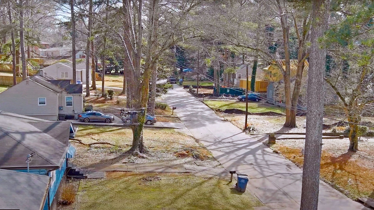 Drone photograph of houses along a street in Grove Park