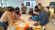 Students sketch the initial ideas on a big drawing